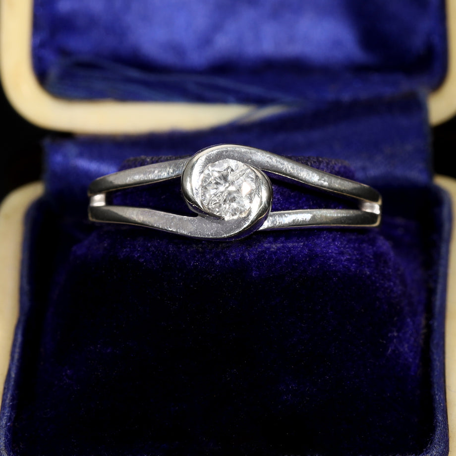 The Contemporary Light Solitaire Diamond Twist Ring