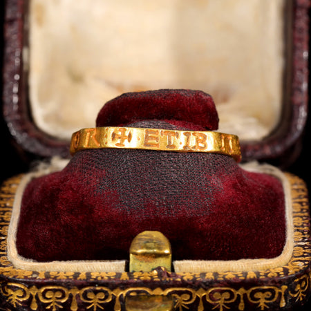 Medieval gold posy ring, circa 1200-1500, inscribed in Lombardic capitals with the Latin phrase 'ET IBI IVNGIT AMOR' meaning 'And there love unites us'