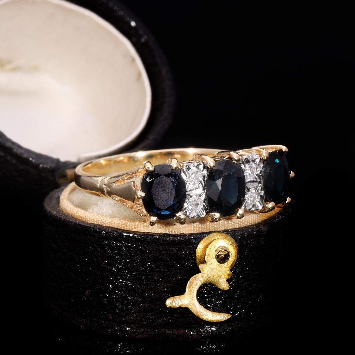 The Vintage 1979 Three Cushion Cut Sapphire And Diamond Ring
