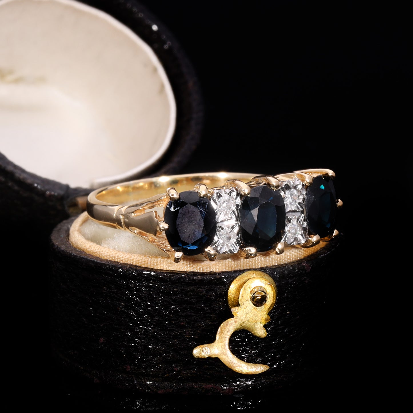 The Vintage 1979 Three Cushion Cut Sapphire And Diamond Ring
