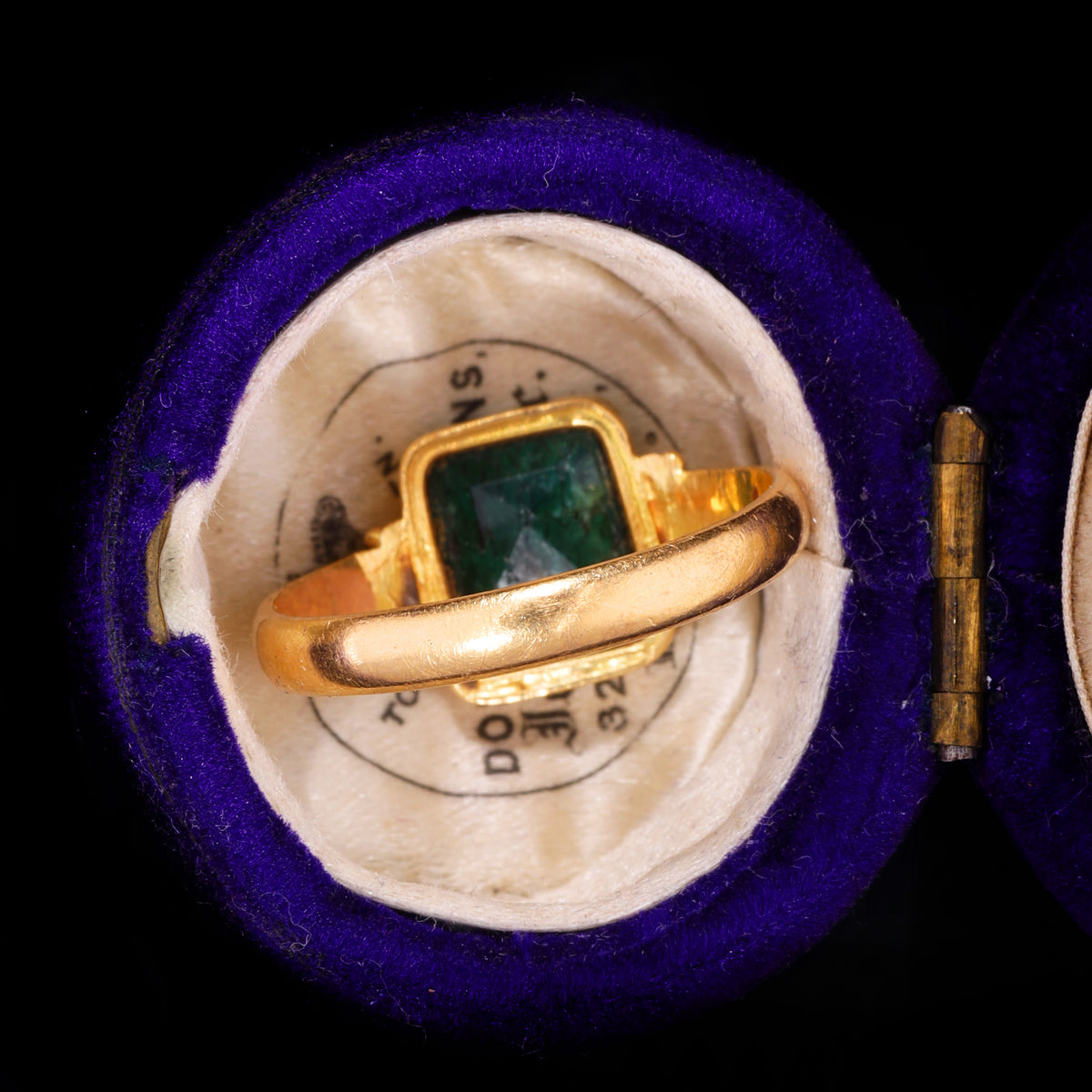 The Antique 19th Century Step Cut Emerald Crimped Edge Ring