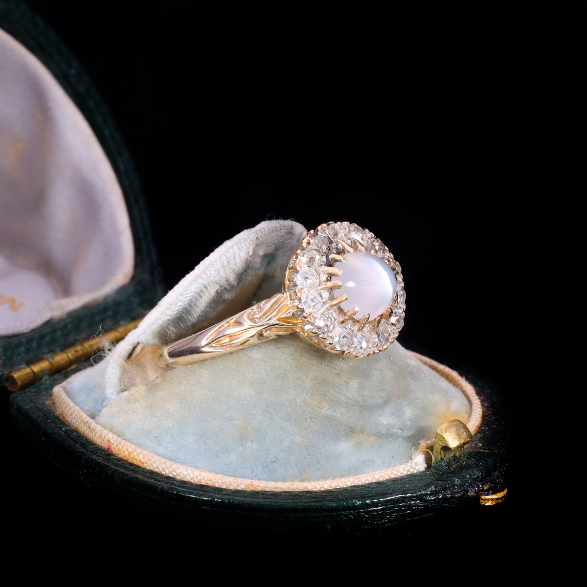 The Antique Victorian Moonstone and Old Cut Diamond Cluster Ring