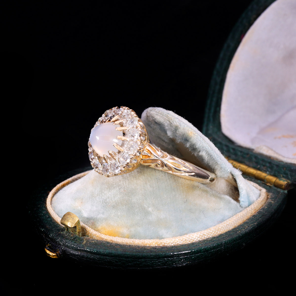The Antique Victorian Moonstone and Old Cut Diamond Cluster Ring