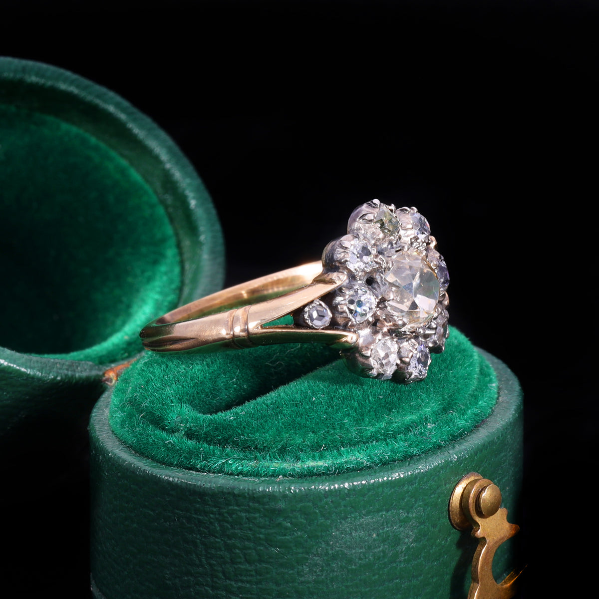 The Antique Georgian Eleven Old European Cut Diamond Cluster Ring